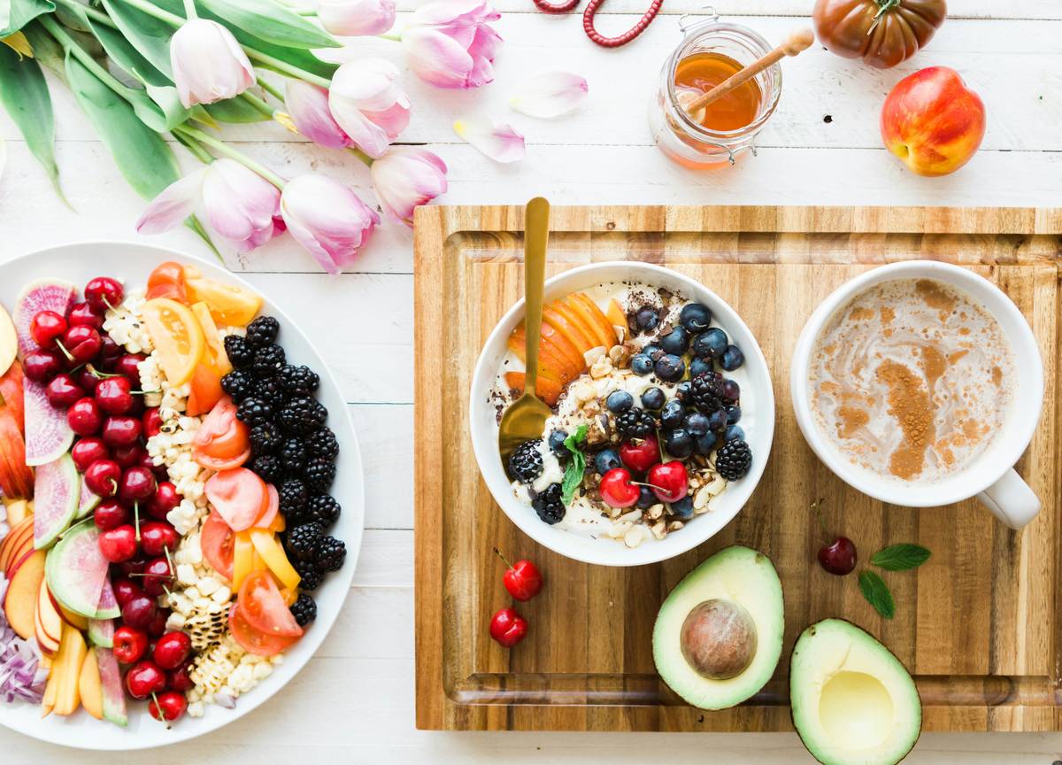 what food helps reduce inflammation - bowl of gut-friendly staples like sardines, sweet potato, and olive oil